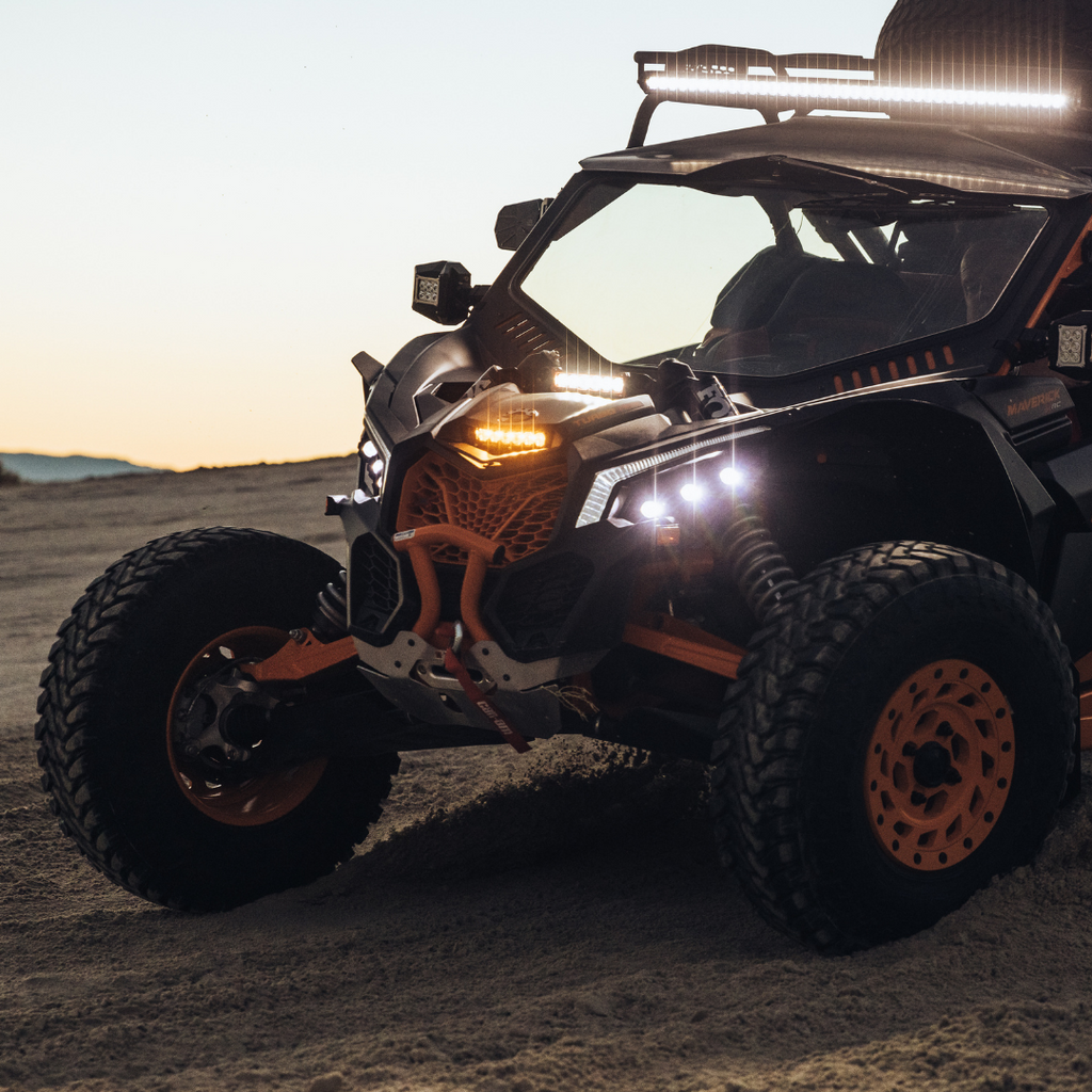 6 inch amber led light bar mounted as a shock tower light on a can-am maverick 